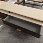 Luxury TV Stand with Rounded Cream Frame Dark Natural Wood Veneer Panels and Stainless Steel Handles